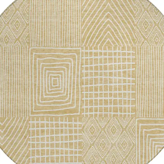 8' Gold And Ivory Round Geometric Washable Indoor Outdoor Area Rug Photo 5