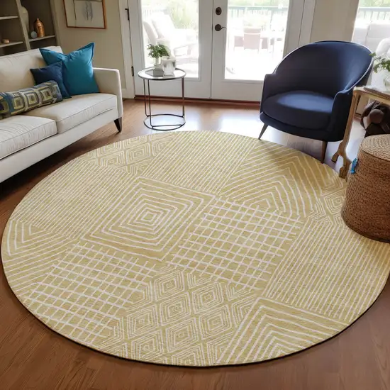 8' Gold And Ivory Round Geometric Washable Indoor Outdoor Area Rug Photo 8
