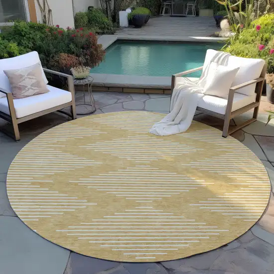 8' Gold And Ivory Round Geometric Washable Indoor Outdoor Area Rug Photo 6