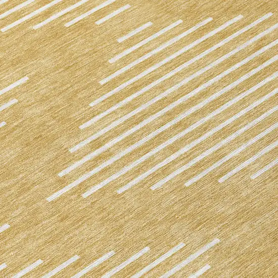 8' Gold And Ivory Round Geometric Washable Indoor Outdoor Area Rug Photo 8