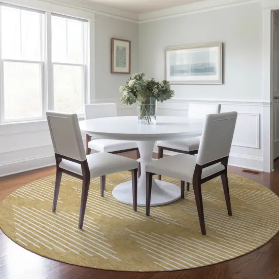 8' Gold And Ivory Round Geometric Washable Indoor Outdoor Area Rug Photo 7