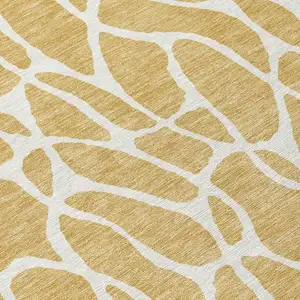 Photo of 8' Gold And Ivory Round Geometric Washable Indoor Outdoor Area Rug
