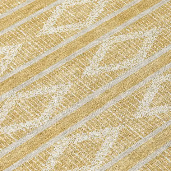 8' Gold And Ivory Round Geometric Washable Indoor Outdoor Area Rug Photo 8