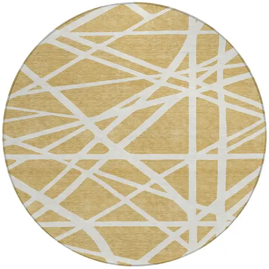 8' Gold And Ivory Round Geometric Washable Indoor Outdoor Area Rug Photo 5