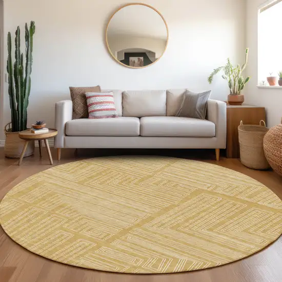 8' Gold And Ivory Round Geometric Washable Indoor Outdoor Area Rug Photo 8
