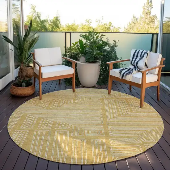 8' Gold And Ivory Round Geometric Washable Indoor Outdoor Area Rug Photo 7