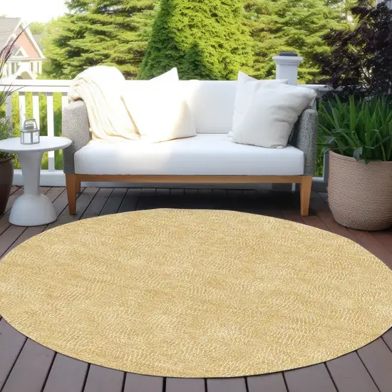 8' Gold And Ivory Round Geometric Washable Indoor Outdoor Area Rug Photo 6