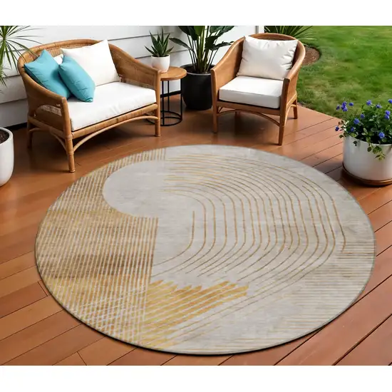 8' Gold And Ivory Round Geometric Washable Indoor Outdoor Area Rug Photo 2