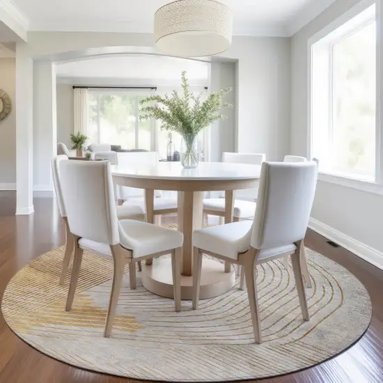 8' Gold And Ivory Round Geometric Washable Indoor Outdoor Area Rug Photo 7