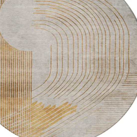 8' Gold And Ivory Round Geometric Washable Indoor Outdoor Area Rug Photo 4