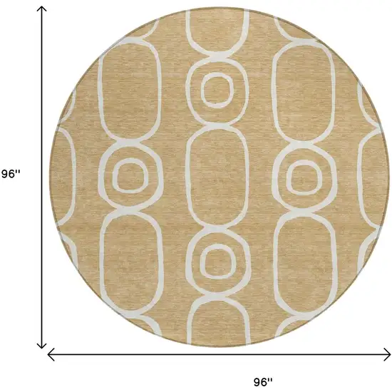 8' Gold And Ivory Round Geometric Washable Indoor Outdoor Area Rug Photo 3