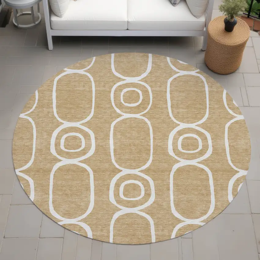 8' Gold And Ivory Round Geometric Washable Indoor Outdoor Area Rug Photo 7