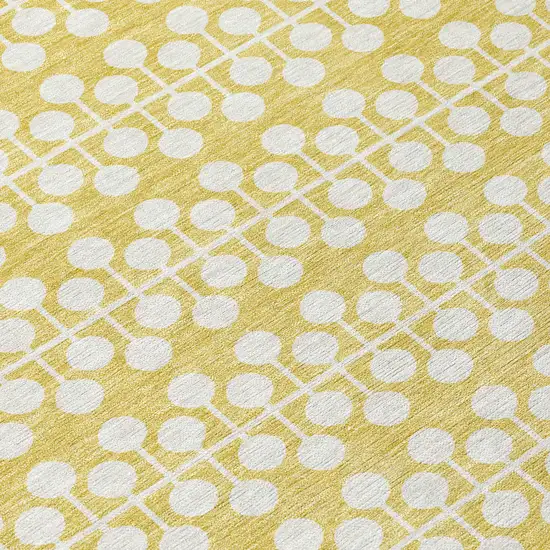 8' Gold And Ivory Round Geometric Washable Indoor Outdoor Area Rug Photo 9