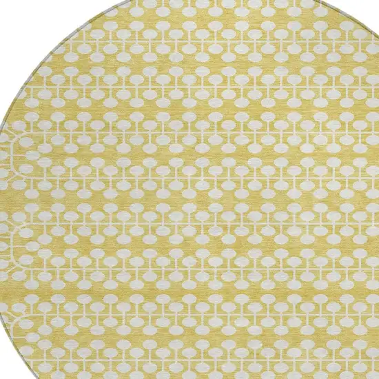 8' Gold And Ivory Round Geometric Washable Indoor Outdoor Area Rug Photo 6
