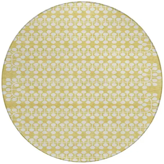 8' Gold And Ivory Round Geometric Washable Indoor Outdoor Area Rug Photo 4