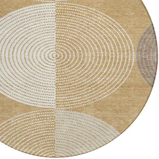 8' Gold And Ivory Round Geometric Washable Indoor Outdoor Area Rug Photo 7