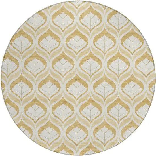 8' Gold And Ivory Round Geometric Washable Indoor Outdoor Area Rug Photo 1