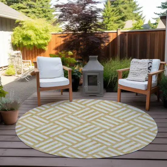 8' Gold And Ivory Round Geometric Washable Indoor Outdoor Area Rug Photo 6