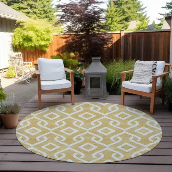 8' Gold And Ivory Round Geometric Washable Indoor Outdoor Area Rug Photo 5