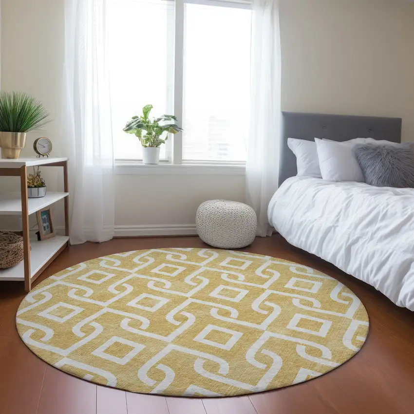 8' Gold And Ivory Round Geometric Washable Indoor Outdoor Area Rug Photo 6