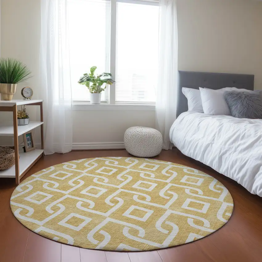 8' Gold And Ivory Round Geometric Washable Indoor Outdoor Area Rug Photo 6
