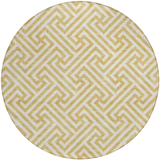 8' Gold And Ivory Round Geometric Washable Indoor Outdoor Area Rug Photo 1