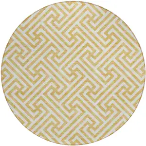 Photo of 8' Gold And Ivory Round Geometric Washable Indoor Outdoor Area Rug