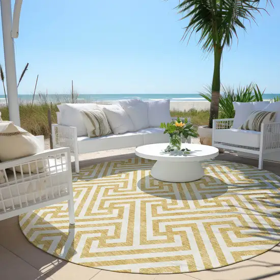 8' Gold And Ivory Round Geometric Washable Indoor Outdoor Area Rug Photo 8