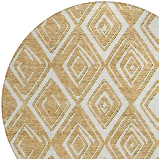 8' Gold And Ivory Round Geometric Washable Indoor Outdoor Area Rug Photo 4