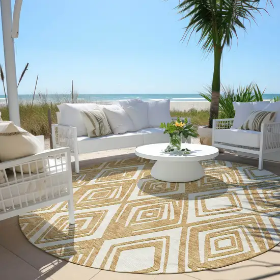 8' Gold And Ivory Round Geometric Washable Indoor Outdoor Area Rug Photo 7