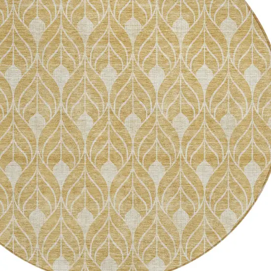 8' Gold And Ivory Round Geometric Washable Indoor Outdoor Area Rug Photo 4