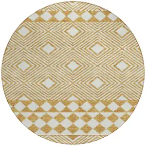 Photo of 8' Gold And Ivory Round Geometric Washable Indoor Outdoor Area Rug