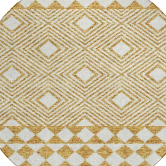 8' Gold And Ivory Round Geometric Washable Indoor Outdoor Area Rug Photo 4
