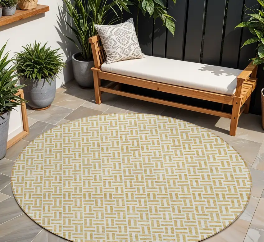 8' Gold And Ivory Round Geometric Washable Indoor Outdoor Area Rug Photo 1