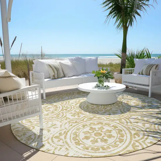 8' Gold And Ivory Round Medallion Washable Indoor Outdoor Area Rug Photo 6