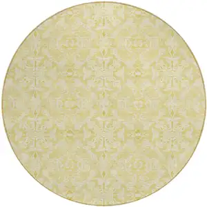 Photo of 8' Gold And Ivory Round Medallion Washable Indoor Outdoor Area Rug