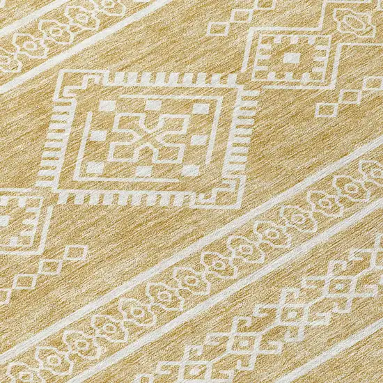 8' Gold And Ivory Round Southwestern Washable Indoor Outdoor Area Rug Photo 5