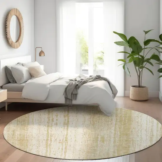 8' Gold And Ivory Round Striped Washable Indoor Outdoor Area Rug Photo 9