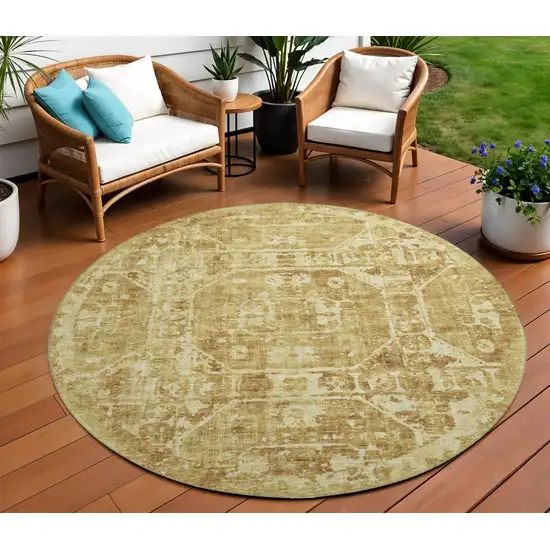 8' Gold And Ivory Round Tribal Washable Indoor Outdoor Area Rug Photo 1