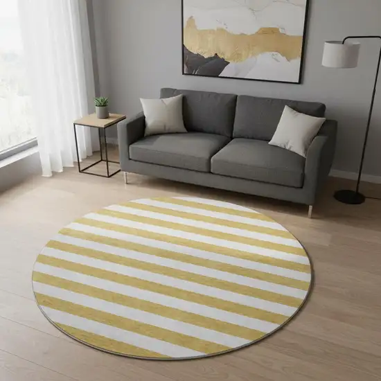 8' Gold And Ivory Striped Washable Round Rug With UV Protection Photo 2