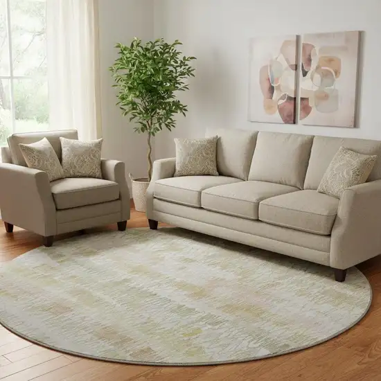 8' Gold And Ivory Striped Washable Round Rug With UV Protection Photo 1