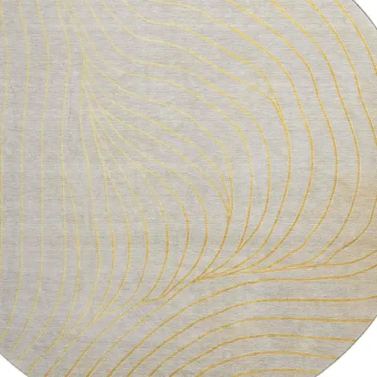 8' Gold And Silver Abstract Washable Round Rug With UV Protection Photo 6