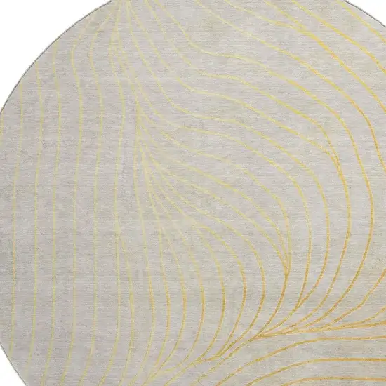 8' Gold And Silver Abstract Washable Round Rug With UV Protection Photo 4