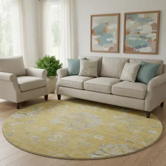 8' Gold And Silver Floral Washable Round Rug With UV Protection Photo 1
