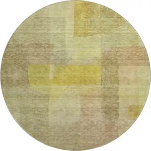 Photo of 8' Gold And Wheat Abstract Washable Round Rug With UV Protection