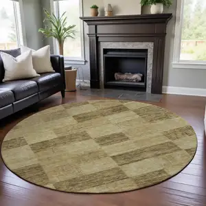 Photo of 8' Gold And Wheat Geometric Washable Round Rug With UV Protection