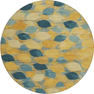 Photo of 8' Gold And Wheat Round Floral Washable Indoor Outdoor Area Rug