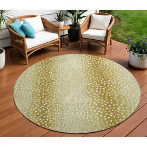 Photo of 8' Gold And White Round Animal Print Washable Indoor Outdoor Area Rug