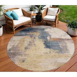 Photo of 8' Gold Beige And Blue Round Abstract Washable Indoor Outdoor Area Rug