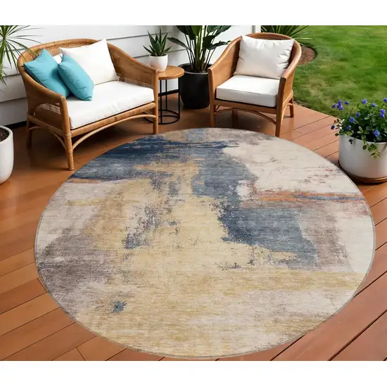 8' Gold Beige And Blue Round Abstract Washable Indoor Outdoor Area Rug Photo 1
